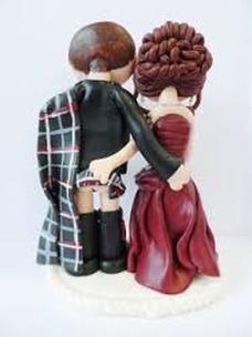 Cake Decoration, girl + boy, boy in kilt, girl with hand down the back of his undies: We don't know if Sandy and Elizabeth had figures like these on their wedding cake, but as Sandy always wears a kilt to special events they seem to fit. Oh, and it's only the English who seem to fuss over what Scots wear under their kilts. What's that say about them? Especially as the wearing of underpants only became common there in the 20th century.